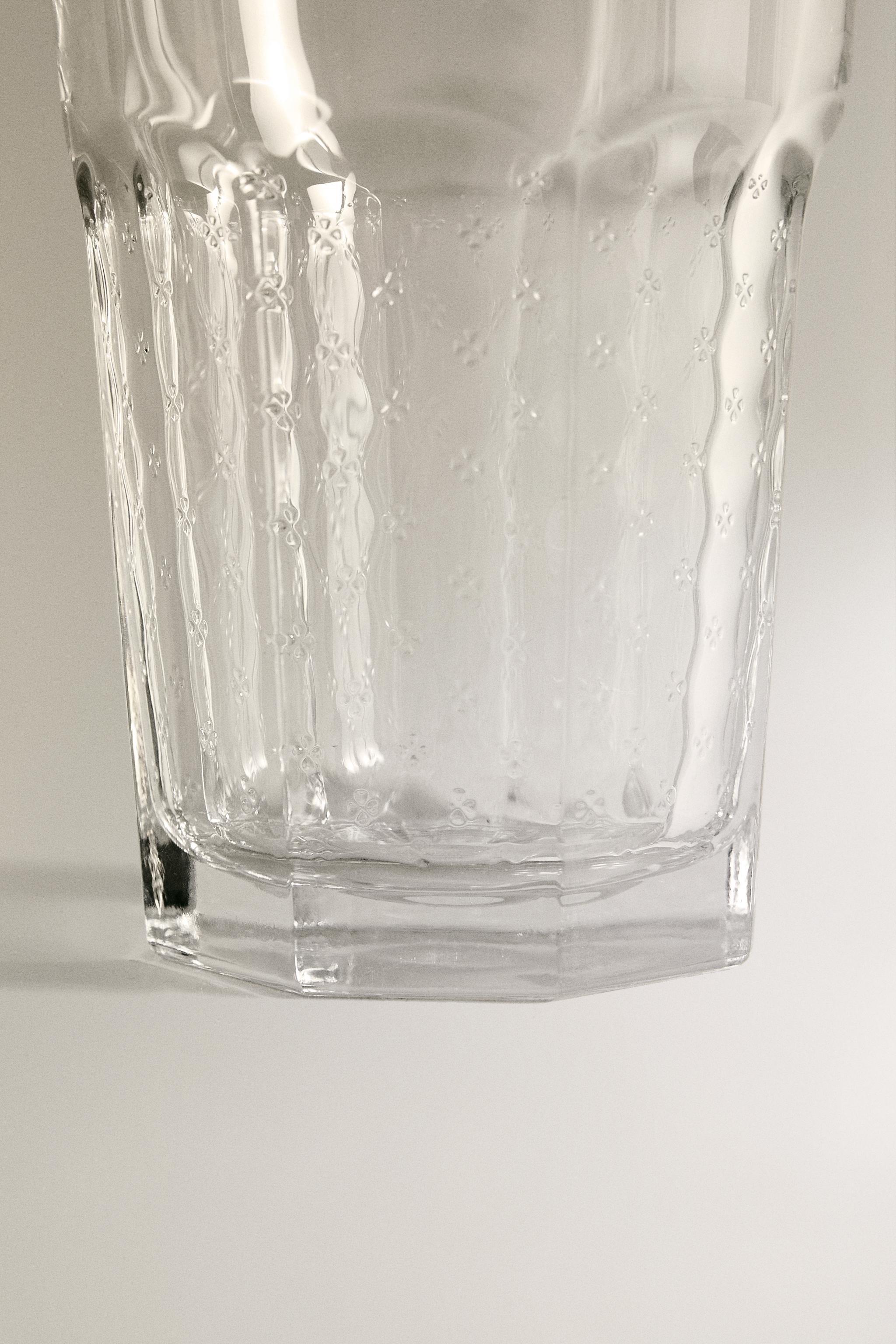RAISED FLORAL DESIGN GLASS TUMBLER
